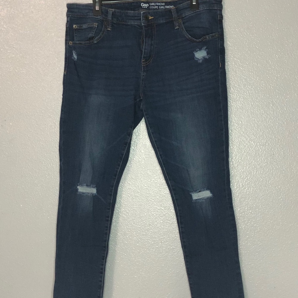 dark blue distressed skinny jeans